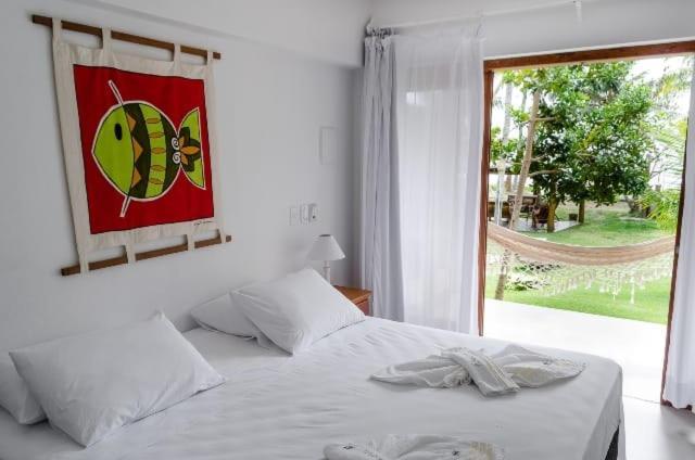 Pousada Areia Preta Cumuruxatiba Bagian luar foto